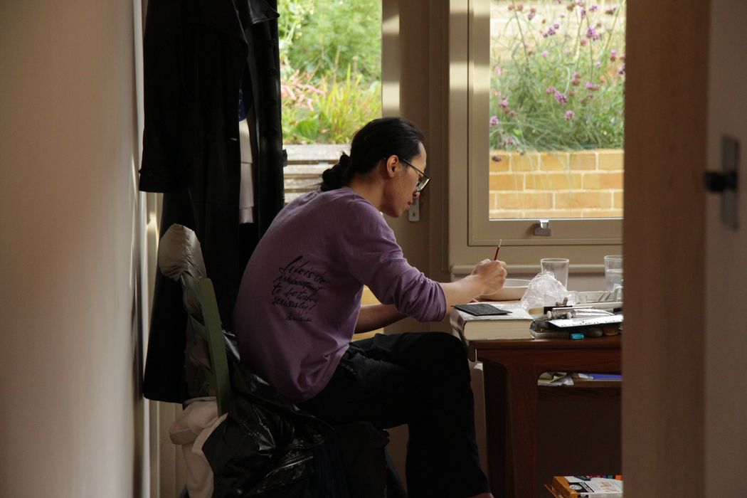 An artist in residence at work in Van Gogh House An artist in residence at work in Van Gogh House